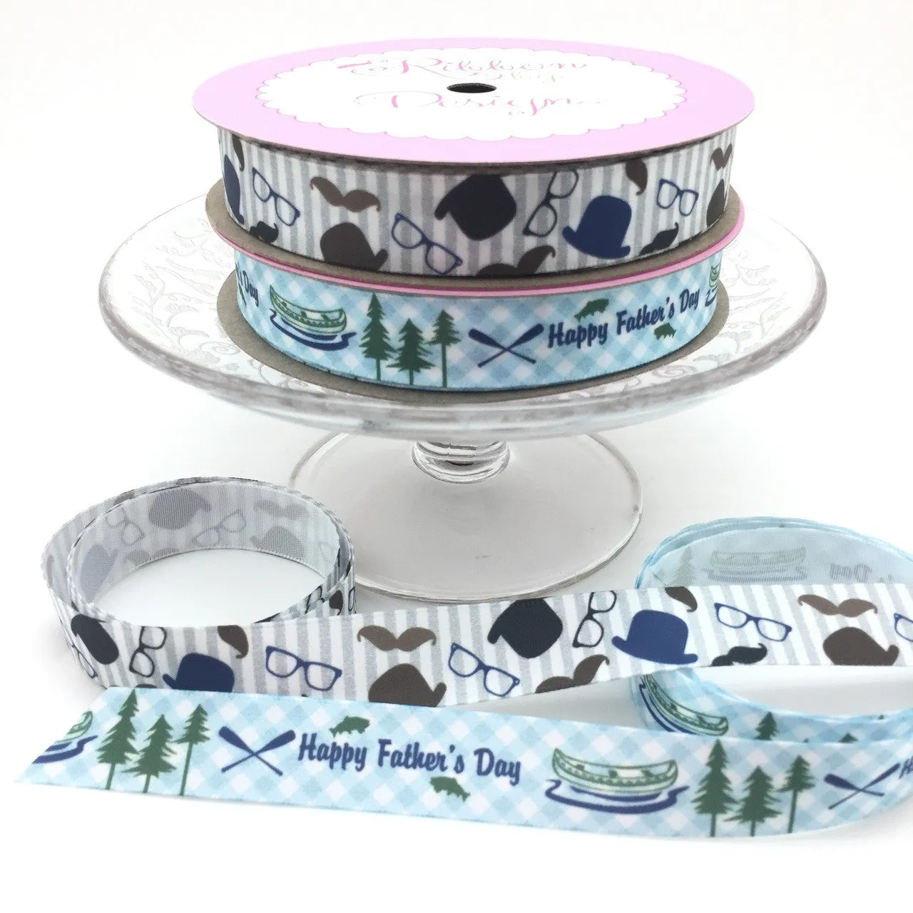 Dapper Dude Ribbon printed on a blue stripe background on 5/8" white single face satin ribbon